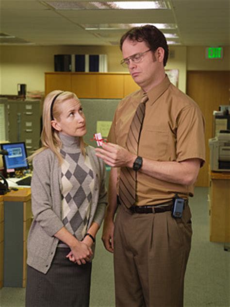 when do angela and dwight start dating